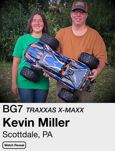 Traxxas X-Maxx remote control car with branding and product details on a brown background