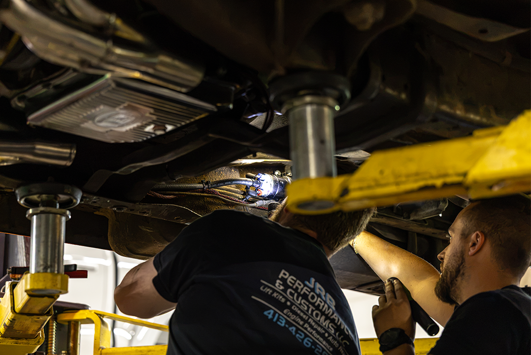Mechanic working under C10
