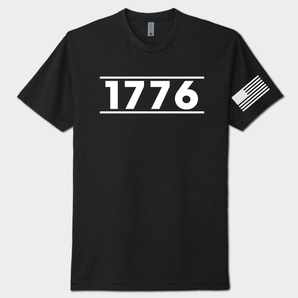 Black t-shirt with '1776' printed on it and a small American flag on the sleeve against a white background.