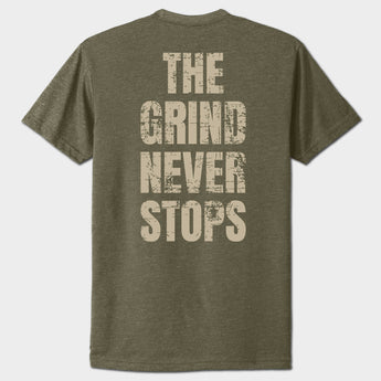 Green t-shirt with 'The Grind Never Stops' text on the back