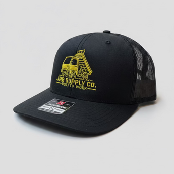 Black JRB7 hat with yellow dump truck graphic and JRB Supply Co text on a white background