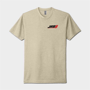 A light heather beige crewneck t-shirt featuring a small 'JRB' logo printed on the left chest in black and red, displayed against a neutral light gray background.