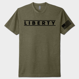 military green t-shirt with 'LIBERTY' text and American flag on sleeve against a white background