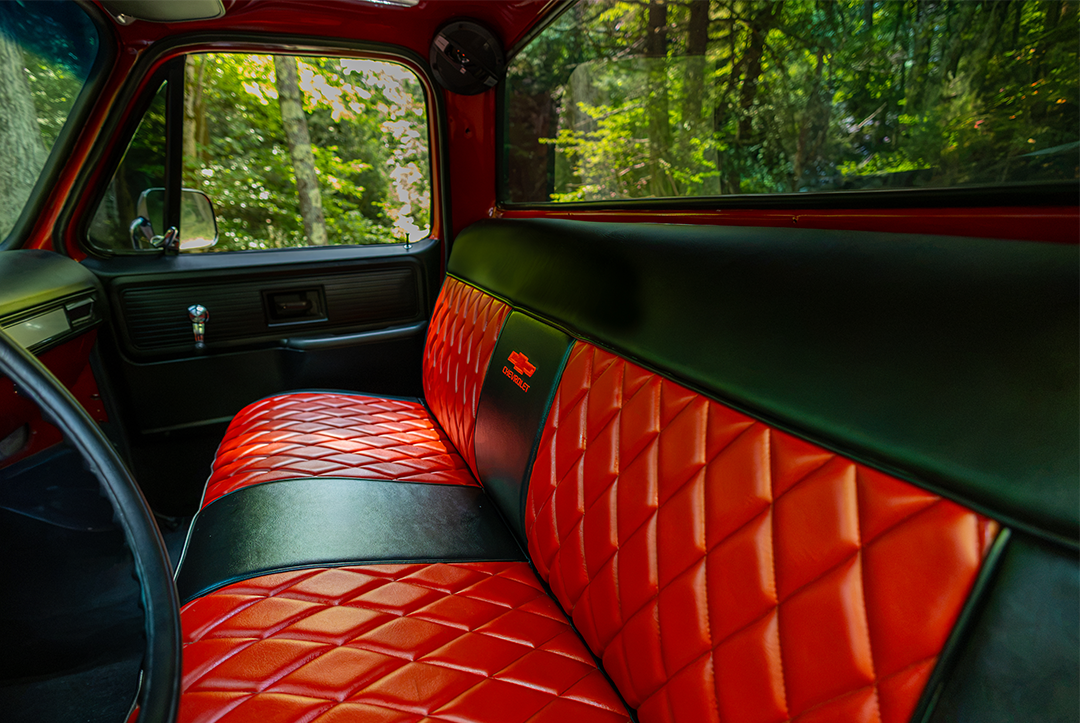 Red quilted C10 bench seat close-up