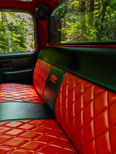 Red quilted C10 bench seat close-up